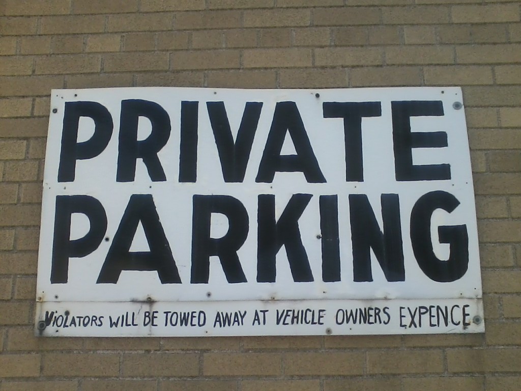 PRIVATE PARKING ViOLATORS WILL BE TOWED AWAY AT VEHICLE OWNERS EXPENCE"