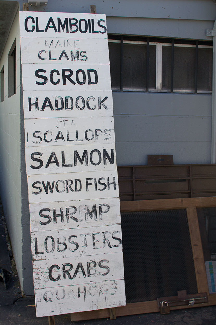 "CLAMBOILS / MAINE CLAMS / SCROD / HADDOCK / SEA SCALLOPS / SALMON / SWORD FISH / SHRIMP / LOBSTERS / CRABS / QUAHOGS / LITTLE NECKS"